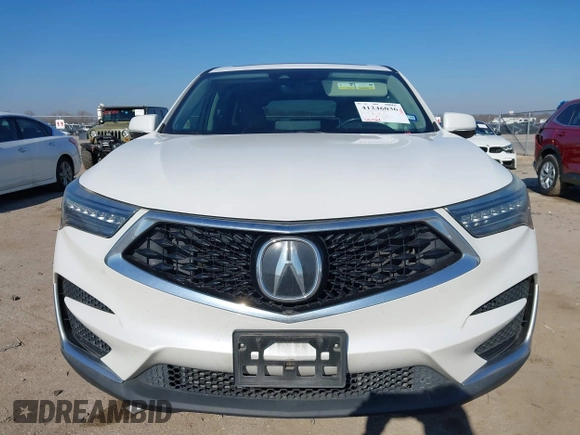 2020 Acura RDX Technology with VIN 5J8TC1H59LL011089, listed as a IAAI auction lot 41246036 with 66,261 mi miles and . Bid and sale history available at DreamBid. Image 12.
