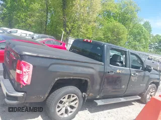 2015 GMC Sierra 1500 SLT with VIN 3GTU2VEC5FG200727, listed as a IAAI auction lot 42017160 with 191,201 mi miles and . Bid and sale history available at DreamBid. Image 13.