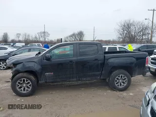 2021 GMC Canyon 4WD AT4 w/Leather with VIN 1GTG6FEN4M1103068, listed as a IAAI auction lot 41673275 with 62,254 mi miles. Bid and sale history available at carsss.com. Image 14.
