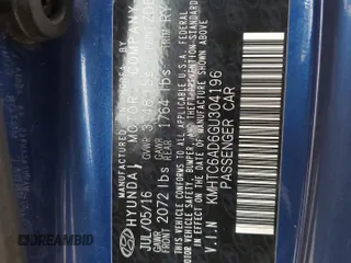 2016 Hyundai Veloster z VIN KMHTC6AD6GU304196, wystawiony jako Copart lot #43694185 z przebiegiem 63 516 mil mil oraz Szkoda całkowita • Salvage title. Historia ofert i sprzedaży dostępna na DreamBid. Obrazek 12.