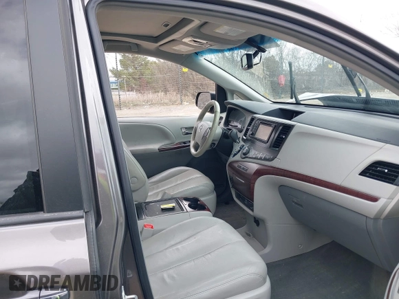 2014 Toyota Sienna XLE with VIN 5TDYK3DC0ES422700, listed as a IAAI auction lot 42049181 with 147,498 mi miles. Bid and sale history available at carsss.com. Image 5.