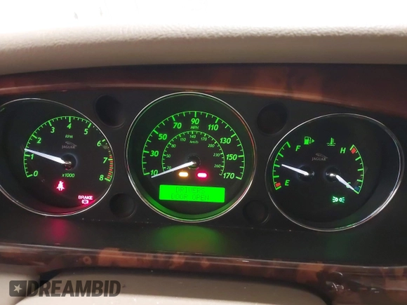 2004 Jaguar XJ with VIN SAJWA71C04SG33993, listed as a IAAI auction lot 41193040 with 79,944 mi miles. Bid and sale history available at carsss.com. Image 7.