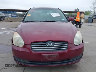 2007 Hyundai Accent GLS with VIN KMHCN46C57U108605, listed as a IAAI auction lot 41932061 with 195,580 mi miles. Bid and sale history available at carsss.com. Image 13.