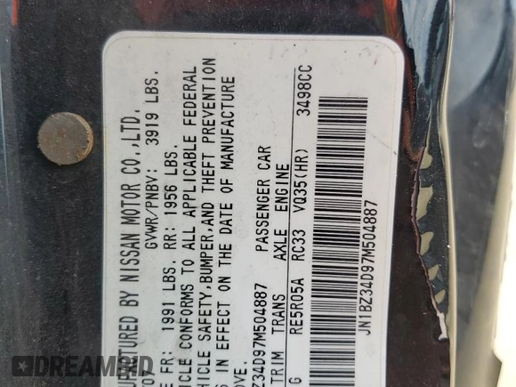 2007 Nissan 350Z with VIN JN1BZ34D97M504887, listed as a Copart auction lot 77140104 with 115,128 mi miles and Salvage Title. Bid and sale history available at DreamBid. Image 12.