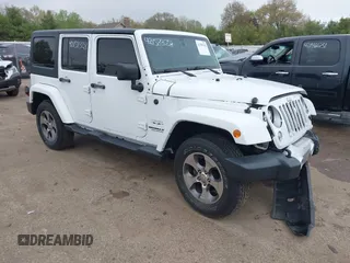 2016 Jeep Wrangler Unlimited Sahara with VIN 1C4HJWEG8GL345391, listed as a IAAI auction lot 42158328 with 61,020 mi miles and . Bid and sale history available at DreamBid. Image 1.