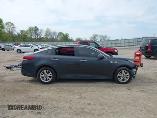 2016 Kia Optima LX with VIN 5XXGT4L38GG023697, listed as a IAAI auction lot 41976461 with 131,023 mi miles. Bid and sale history available at carsss.com. Image 13.