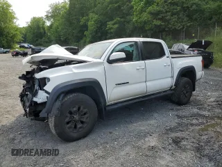 2021 Toyota Tacoma SR with VIN 3TYCZ5AN1MT044817, listed as a Copart auction lot 60613795 with 39,295 mi miles and Salvage title. Bid and sale history available at DreamBid. Image 1.