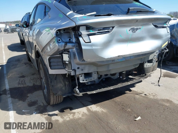 2021 Ford Mustang Mach-E Select z VIN 3FMTK1RM3MMA07686, wystawiony jako IAAI lot #41702088 z przebiegiem 26 158 mil mil oraz . Historia ofert i sprzedaży dostępna na DreamBid. Obrazek 20.