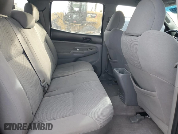 2009 Toyota Tacoma z VIN 3TMLU42N09M030420, wystawiony jako Copart lot #84889784 z przebiegiem 322 393 mil mil oraz Szkoda całkowita • Salvage title. Historia ofert i sprzedaży dostępna na DreamBid. Obrazek 10.