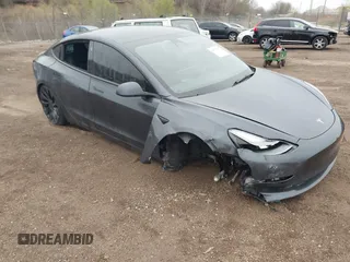 2022 Tesla Model 3 Performance z VIN 5YJ3E1EC1NF330567, wystawiony jako IAAI lot #42052897 z przebiegiem Nie podano mil oraz . Historia ofert i sprzedaży dostępna na DreamBid. Obrazek 1.