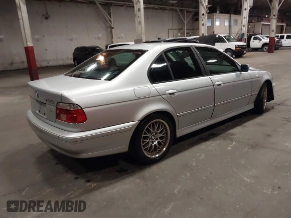 2003 BMW 5 Series 530iA with VIN WBADT63483CK43601, listed as a IAAI auction lot 41808414 with 132,050 mi miles. Bid and sale history available at carsss.com. Image 4.