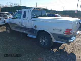 1998 Ford F-150 with VIN 2FTZX08W0WCA98105, listed as a IAAI auction lot 40930475 with Not provided miles and . Bid and sale history available at DreamBid. Image 3.
