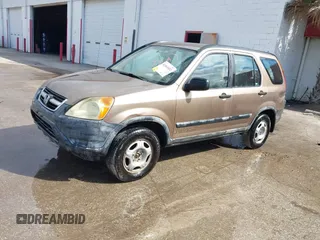 2003 Honda CR-V LX with VIN JHLRD68513C009276, listed as a IAAI auction lot 41563452 with 240,519 mi miles and . Bid and sale history available at DreamBid. Image 2.