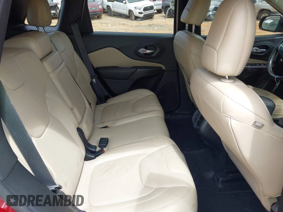 2015 Jeep Cherokee Limited with VIN 1C4PJMDS1FW571937, listed as a IAAI auction lot 42106209 with 162,666 mi miles and . Bid and sale history available at DreamBid. Image 8.