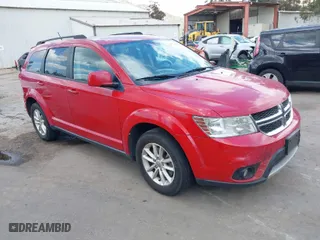 2016 Dodge Journey SXT with VIN 3C4PDDBG9GT163294, listed as a IAAI auction lot 41939520 with 166,001 mi miles. Bid and sale history available at carsss.com. Image 1.