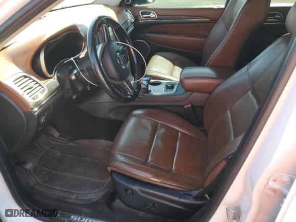 2015 Jeep Grand Cherokee Summit with VIN 1C4RJFJM3FC731831, listed as a Copart auction lot 66570534 with 230,193 mi miles and Clean Title. Bid and sale history available at carsss.com. Image 7.
