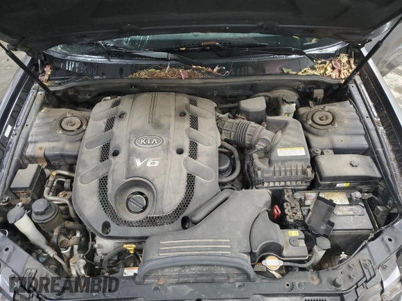 2008 Kia Amanti z VIN KNALD125185165602, wystawiony jako Copart lot #83548154 z przebiegiem 78 734 mil mil oraz Szkoda całkowita • Salvage title. Historia ofert i sprzedaży dostępna na DreamBid. Obrazek 11.