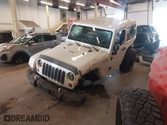 2012 Jeep Wrangler Arctic z VIN 1C4AJWBG9CL233232, wystawiony jako IAAI lot #42282805 z przebiegiem 109 927 mil mil oraz . Historia ofert i sprzedaży dostępna na DreamBid. Obrazek 2.