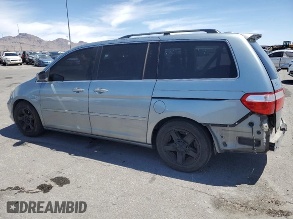2005 Honda Odyssey Touring z VIN 5FNRL38805B131416, wystawiony jako Copart lot #59157395 z przebiegiem 263 087 mil mil oraz Szkoda całkowita • Salvage title. Historia ofert i sprzedaży dostępna na DreamBid. Obrazek 2.