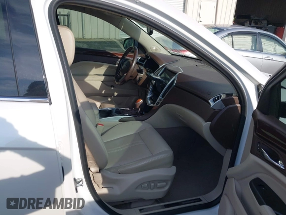 2013 Cadillac SRX Premium Collection with VIN 3GYFNJE33DS625036, listed as a IAAI auction lot 42464711 with 83,344 mi miles and . Bid and sale history available at DreamBid. Image 5.