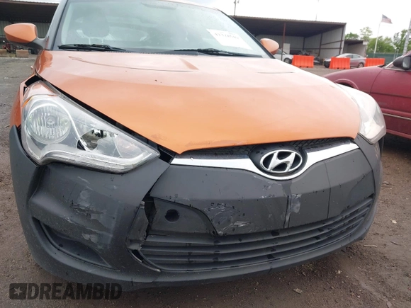 2012 Hyundai Veloster w/Gray Int with VIN KMHTC6AD3CU057620, listed as a IAAI auction lot 42320549 with 113,491 mi miles and . Bid and sale history available at DreamBid. Image 6.