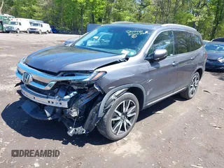 2021 Honda Pilot Touring 8-Passenger z VIN 5FNYF6H9XMB059037, wystawiony jako IAAI lot #42202410 z przebiegiem 49 267 mil mil oraz . Historia ofert i sprzedaży dostępna na DreamBid. Obrazek 18.