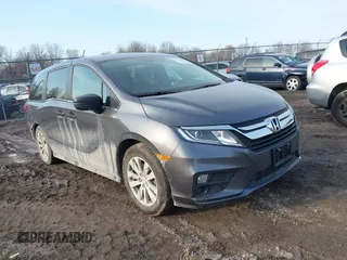 2018 Honda Odyssey LX with VIN 5FNRL6H27JB095795, listed as a IAAI auction lot 41780386 with 99,318 mi miles. Bid and sale history available at carsss.com. Image 1.