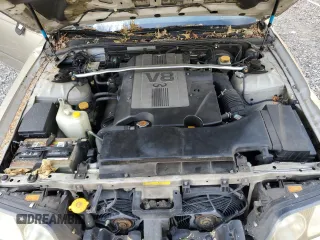 2000 Infiniti Q45 z VIN JNKBY31A0YM301297, wystawiony jako Copart lot #74672884 z przebiegiem 171 263 mil mil oraz Szkody całkowita. Historia ofert i sprzedaży dostępna na DreamBid. Obrazek 11.