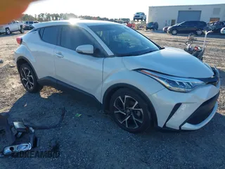 2020 Toyota C-HR LE with VIN NMTKHMBX9LR114159, listed as a IAAI auction lot 41082427 with 22,511 mi miles. Bid and sale history available at carsss.com. Image 1.