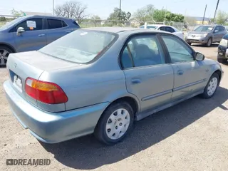 2000 Honda Civic VP with VIN 2HGEJ6616YH553654, listed as a IAAI auction lot 41551656 with 210,433 mi miles. Bid and sale history available at carsss.com. Image 4.