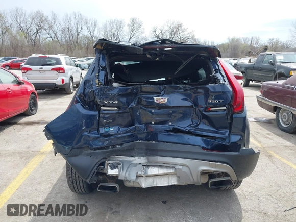 2021 Cadillac XT4 AWD Premium Luxury z VIN 1GYFZDR45MF048569, wystawiony jako IAAI lot #41902941 z przebiegiem 53 891 mil mil oraz . Historia ofert i sprzedaży dostępna na DreamBid. Obrazek 6.