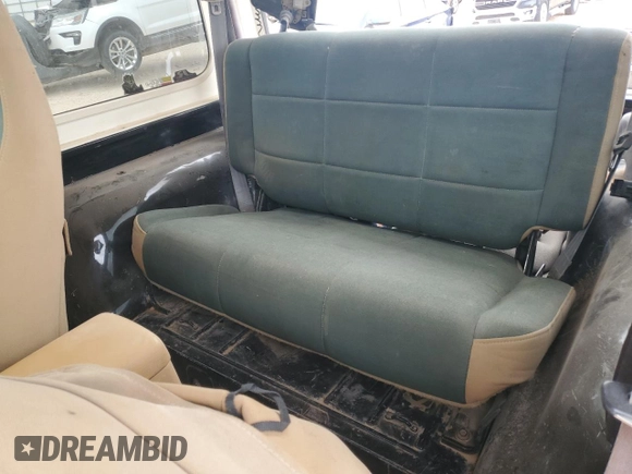 1998 Jeep Wrangler Sahara with VIN 1J4FY49S0WP749826, listed as a Copart auction lot 55174205 with 203,574 mi miles and Salvage title. Bid and sale history available at DreamBid. Image 10.