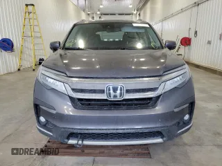 2019 Honda Pilot Touring 8-Passenger z VIN 5FNYF6H93KB502528, wystawiony jako Copart lot #51811045 z przebiegiem 157 204 mil mil oraz Czysty tytuł • Clean title. Historia ofert i sprzedaży dostępna na DreamBid. Obrazek 5.