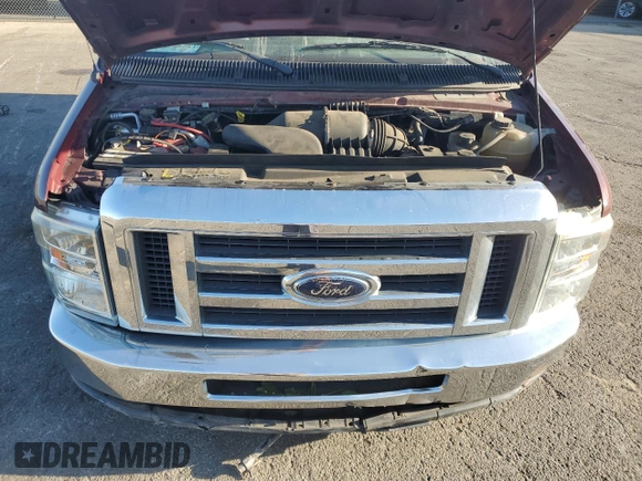 2010 Ford Econoline Passenger XL with VIN 1FMNE1BW6ADA87472, listed as a Copart auction lot 74989314 with 215,315 mi miles and Salvage Title. Bid and sale history available at DreamBid. Image 12.