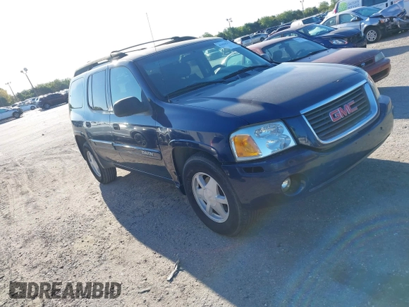 2003 GMC Envoy SLT z VIN 1GKET16S736233956, wystawiony jako IAAI lot #41844351 z przebiegiem 244 942 mil mil oraz . Historia ofert i sprzedaży dostępna na DreamBid. Obrazek 1.