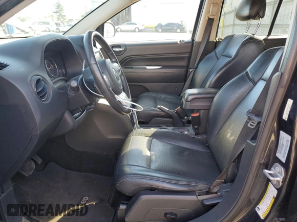 2015 Jeep Compass Limited with VIN 1C4NJDCB7FD177170, listed as a Copart auction lot 87464674 with 77,212 mi miles and Salvage Title. Bid and sale history available at carsss.com. Image 7.