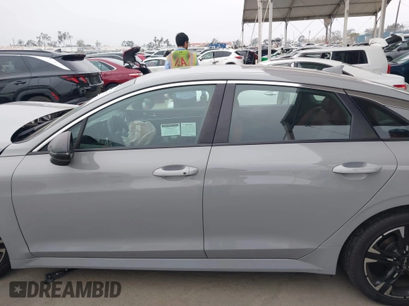 2023 Kia K5 GT-Line z VIN 5XXG64J27PG199321, wystawiony jako IAAI lot #42153677 z przebiegiem 28 798 mil mil oraz . Historia ofert i sprzedaży dostępna na DreamBid. Obrazek 14.