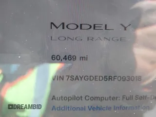 2024 Tesla Model Y with VIN 7SAYGDED5RF093018, listed as a IAAI auction lot 41747467 with 60,469 mi miles and . Bid and sale history available at DreamBid. Image 15.