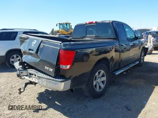 2005 Nissan Titan XE with VIN 1N6BA06A15N560400, listed as a IAAI auction lot 41656560 with 212,568 mi miles. Bid and sale history available at carsss.com. Image 4.
