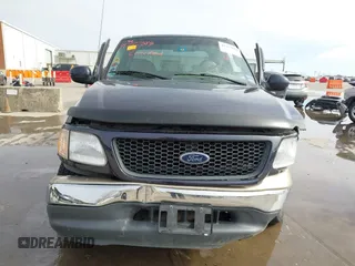 2000 Ford F-150 XL with VIN 1FTRX17L2YNB85627, listed as a IAAI auction lot 41377814 with 123,740 mi miles. Bid and sale history available at carsss.com. Image 13.