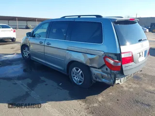 2006 Honda Odyssey EX with VIN 5FNRL38436B001144, listed as a IAAI auction lot 41372589 with 255,666 mi miles. Bid and sale history available at carsss.com. Image 3.