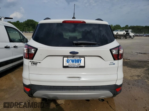 2018 Ford Escape SE z VIN 1FMCU9GD5JUB29050, wystawiony jako Copart lot #55166745 z przebiegiem 79 939 mil mil oraz Czysty tytuł • Clean title. Historia ofert i sprzedaży dostępna na DreamBid. Obrazek 6.