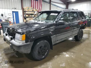 1995 Jeep Grand Cherokee Laredo with VIN 1J4GZ58Y5SC565187, listed as a Copart auction lot 45179985 with 122,863 mi miles and Salvage Title. Bid and sale history available at carsss.com. Image 1.