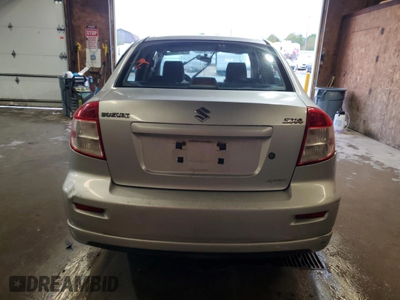 2010 Suzuki SX4 with VIN JS2YC5A49A6310256, listed as a Copart auction lot 73210584 with 135,021 mi miles and Salvage Title. Bid and sale history available at DreamBid. Image 6.