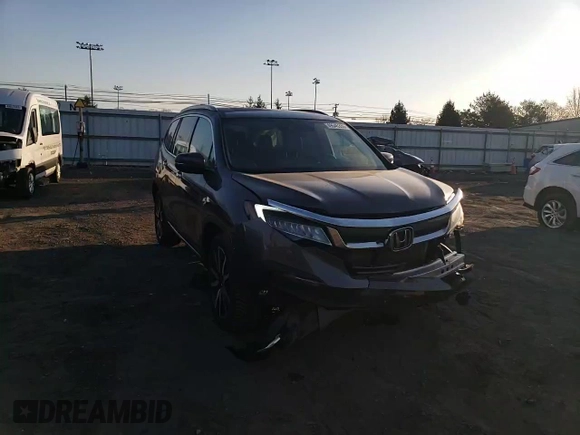 2020 Honda Pilot Touring 8-Passenger with VIN 5FNYF6H92LB031005, listed as a Copart auction lot 49545335 with 59,789 mi miles and Salvage Title. Bid and sale history available at DreamBid. Image 12.