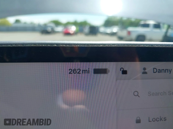 2022 Tesla Model Y Long Range with VIN 7SAYGDEE7NF426404, listed as a IAAI auction lot 42040490 with 39,635 mi miles and . Bid and sale history available at carsss.com. Image 17.