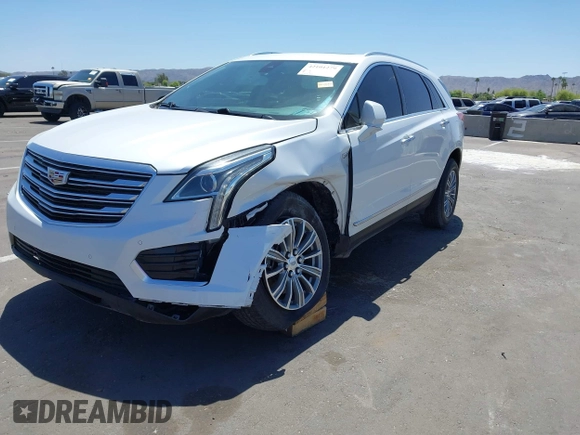 2017 Cadillac XT5 Luxury AWD z VIN 1GYKNDRS8HZ120863, wystawiony jako IAAI lot #42101279 z przebiegiem 100 535 mil mil oraz . Historia ofert i sprzedaży dostępna na DreamBid. Obrazek 2.