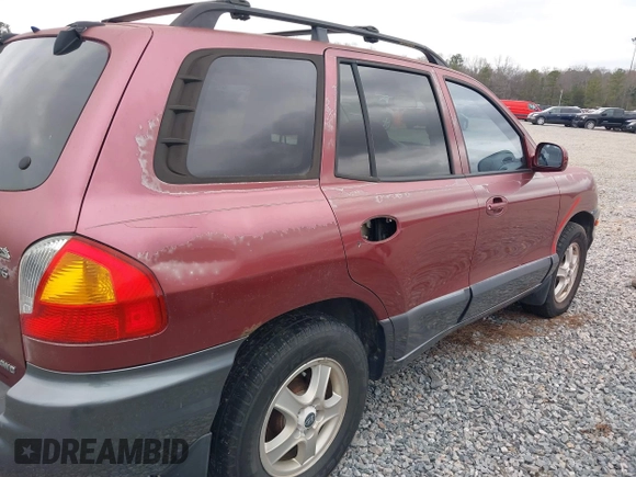 2002 Hyundai Santa Fe GLS with VIN KM8SC73D72U306997, listed as a IAAI auction lot 41519773 with 244,398 mi miles. Bid and sale history available at carsss.com. Image 16.