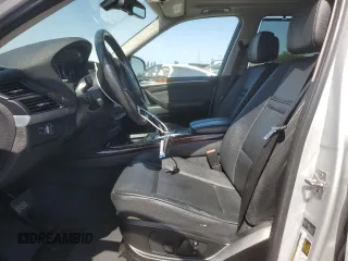 2012 BMW X5 35i with VIN 5UXZV4C5XCL751020, listed as a Copart auction lot 59327845 with 106,249 mi miles and Salvage title. Bid and sale history available at DreamBid. Image 7.