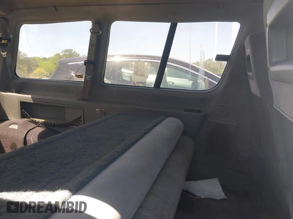 1992 Ford Aerostar z VIN 1FMDA11U3NZA96405, wystawiony jako IAAI lot #42029982 z przebiegiem 158 724 mil mil oraz . Historia ofert i sprzedaży dostępna na DreamBid. Obrazek 8.